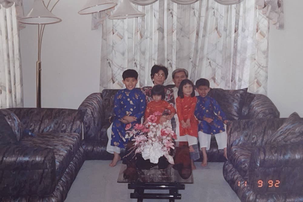 A family photograph from 1992, children in a living room